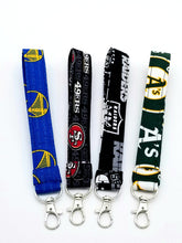 Load image into Gallery viewer, Wristlet, Key chains, Key fob, Warriors key chain, A&#39;s key chain, 49ers key chain, Raiders key chain
